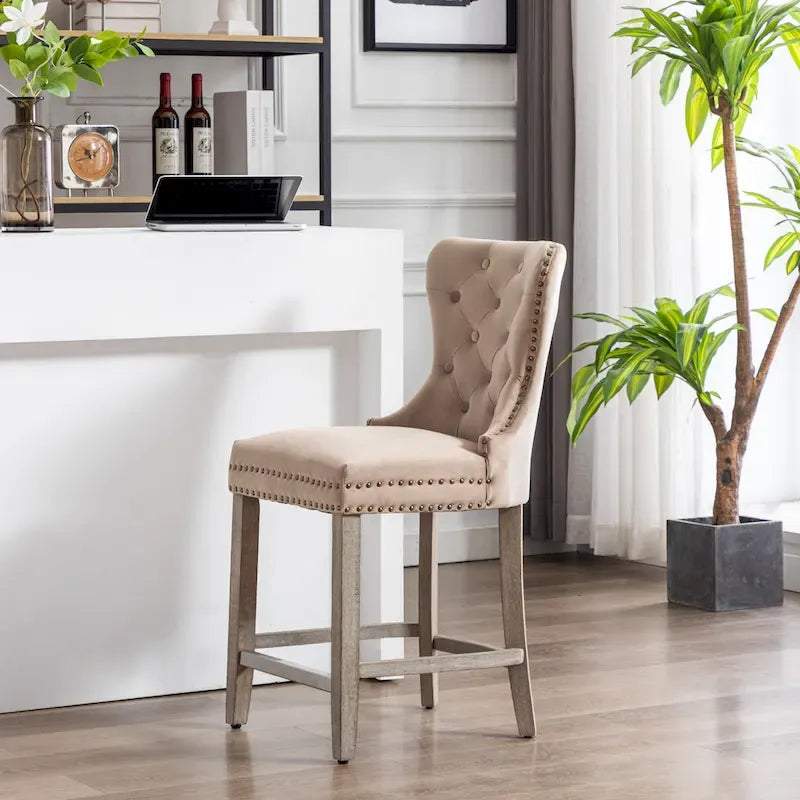 Sgabello da bancone Carter 24 Wingback capitonné con borchie e gambe grigio antico 23