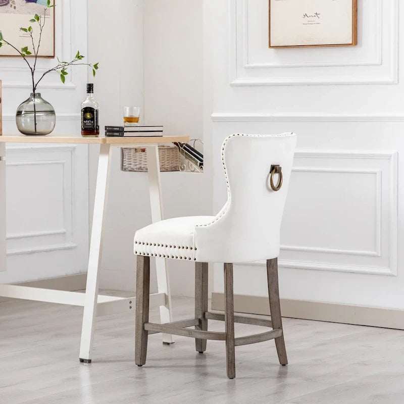 Sgabello da bancone Carter 24 Wingback capitonné con borchie e gambe grigio antico 30
